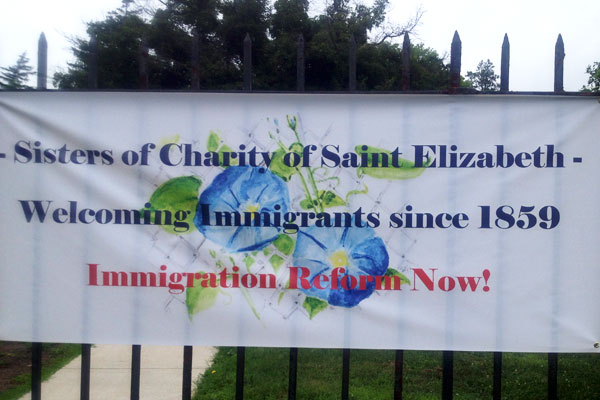SCNJ-immigration-sign
